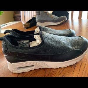 Nike size 8 slip on sneakers. Great condition. Leather
